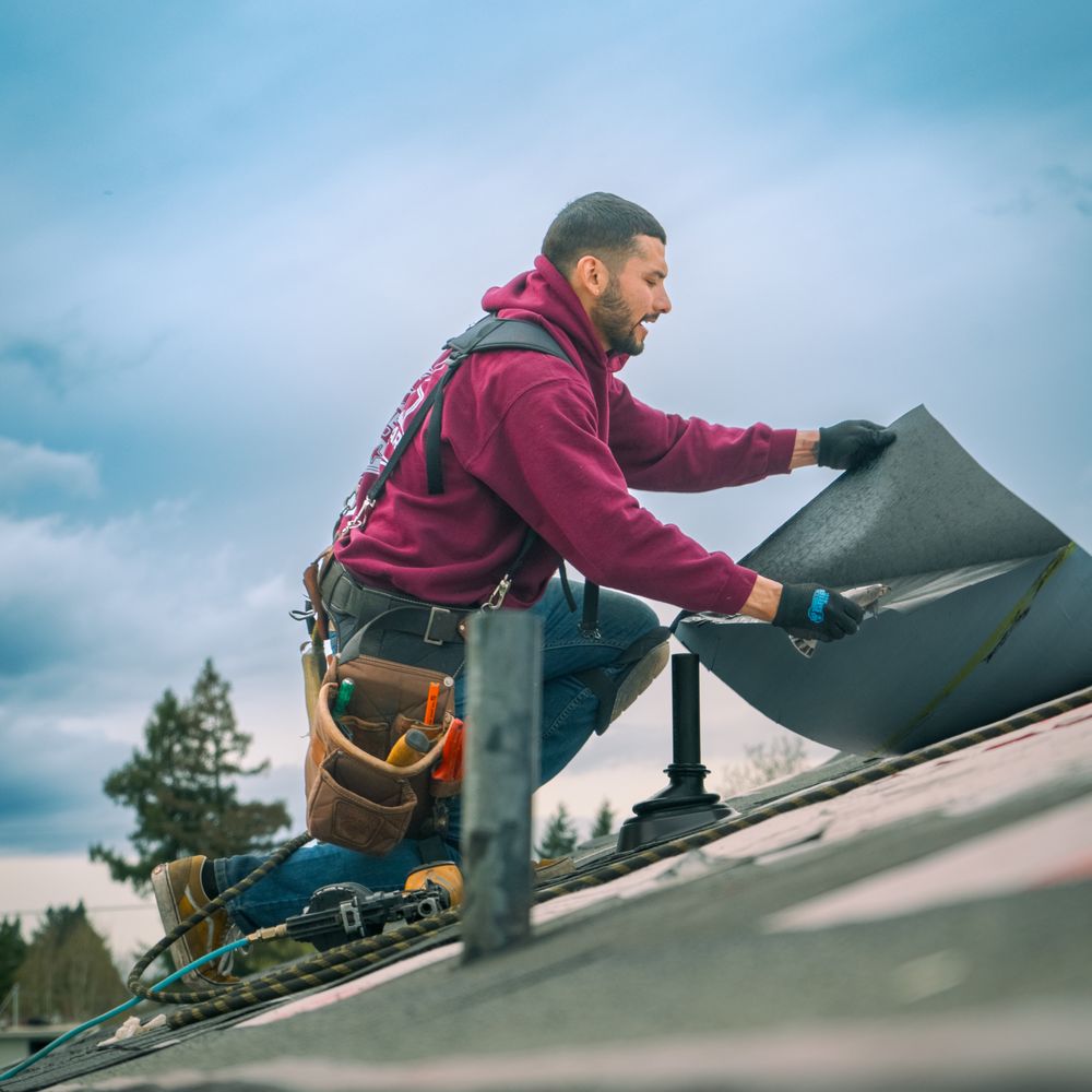 Roofing professional at work